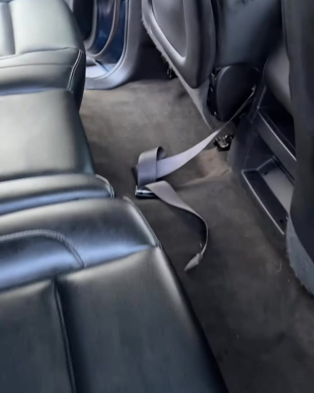 The same rear floor and seats after a JCDetailing interior detail, clean and clear of debris